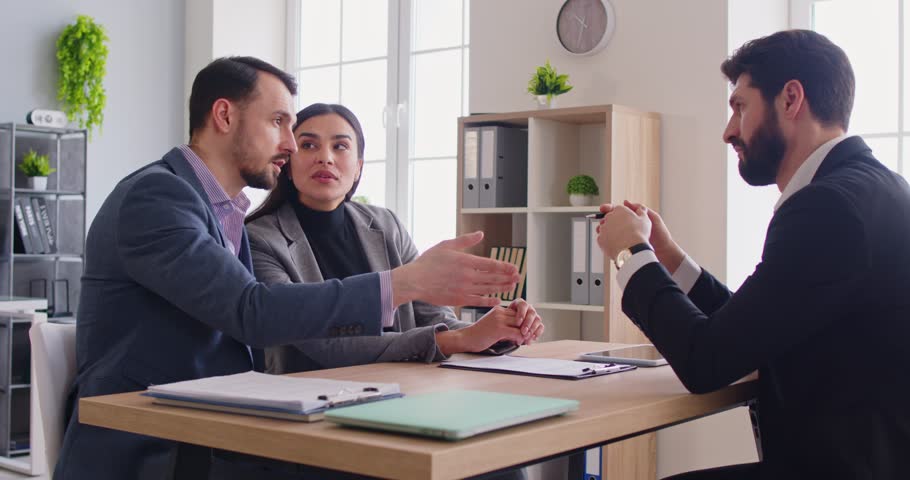 Couple coming on meeting with real estate, business broker or lawyer, taking consultancy, discussing contract agreement , posing in office. Financial advisor giving advice to business clients