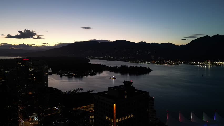 vancouver harbour sunset and gorgeous summer sunset over english bay, downtown skyline drone aerial