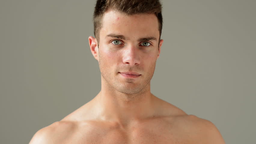 Close up Portrait of Caucasian Male Model Posing on Gray Background