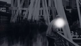 Grayscale footbridge opening, 3D globe fading in, rotating rings and orbiting icons showing network. Technology, connectivity, urban, infrastructure, digital, innovation, networking - Powered by Shutterstock - Get 15% off with code: PIKWIZARD15