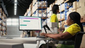 African american worker with disability uses airway bill numbers for tracking info on software, monitoring the order parcel status in a distribution hub. Managing shipment operations. Camera A. - Powered by Shutterstock - Get 15% off with code: PIKWIZARD15