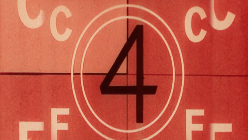 Countdown Leader, Picture Start. 4K Scan of 16mm Film in widescreen or 16x9 format. Red Tint Countdown from 8 to 2. Authentic Vintage Archival Motion Picture. Retro Countdown Clock. 