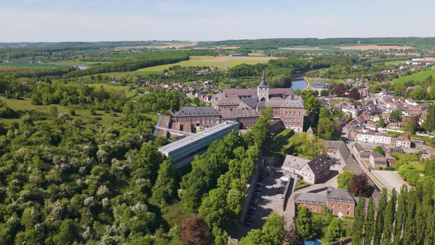 town below parked cars main building floreffe abbey belgium perspective area
