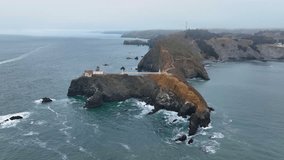 Point Bonita Lighthouse in cloudy day with fog at Point Bonita at San Francisco Bay in Marin Headlands in Marin County, California CA, USA. This lighthouse is in Golden Gate National Recreation Area.  - Powered by Shutterstock - Get 15% off with code: PIKWIZARD15