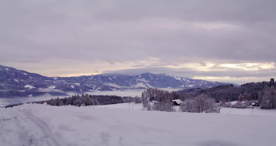 "Majestic Snowy Mountains of Austria in Winter — Breathtaking Footage Featuring Towering Peaks, Frozen Slopes, and the Pristine Tranquility of a Classic European Alpine Landscape"