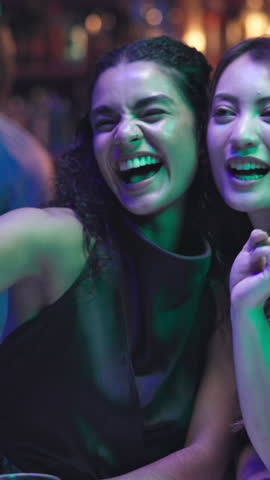 Selfie, happy and girl friends in nightclub with fun, excitement or bonding together at party. Smile, peace sign and female people with photography picture for social media at event on weekend.