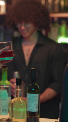 Cheers, drinks and girl friends in nightclub for fun, reunion or social event together at bar. Happy hour, excited and female people with alcohol beverage for toast, celebration or party at pub.