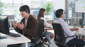 Business meeting tech support call center teamwork with headset and computer in modern office environment providing efficient support and collaboration among diverse employees - Powered by Shutterstock - Get 15% off with code: PIKWIZARD15