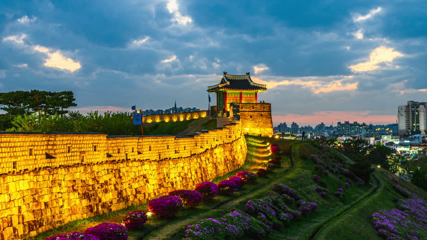 4K Time-lapse Video (Zoom Out) After Sunset at Hwaseong Fortress, a UNESCO World Heritage Site. Hwaseong Fortress in Spring, Suwon, South Korea.