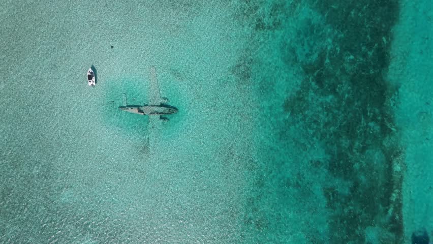 Aerial view of boat and shipwreck, The Bahamas.
