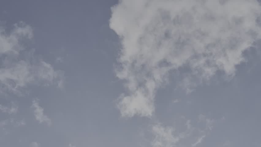 4K, HDR 10+ Video Footage of Beautiful and Vibrant Blue Sky with misty Clouds, Nature and Documentary backdrop, motivational or inspirational backdrop, Background for quotes, messages, Climate concept