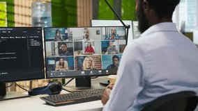 Tech startup office team collaborating via videocall, doing brainstorming on backup solutions to protect against data loss. Remote developers doing AI coding during online teleconference, camera A - Powered by Shutterstock - Get 15% off with code: PIKWIZARD15