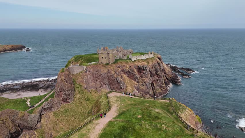 Drone footage of Dunnottar Castle on the North Sea coast, Scotland, UK