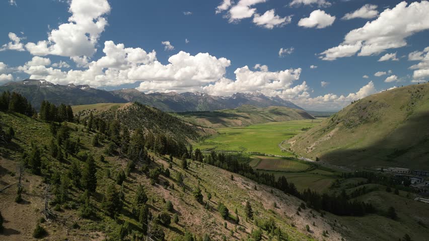 Aerial of Bridger Teton mountain range in summer from Alta Wyoming