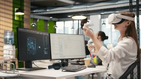 Female technician wearing VR goggles coding with AI language model assistance in startup office. Young woman using virtual reality integrating LLM assistant suggestions into code editor, camera A - Powered by Shutterstock - Get 15% off with code: PIKWIZARD15