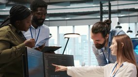 Welcoming team assisting intern developing artificial intelligence models for business analytics. Friendly coworkers helping junior dev running simulations for AI driven forecasting, camera A - Powered by Shutterstock - Get 15% off with code: PIKWIZARD15