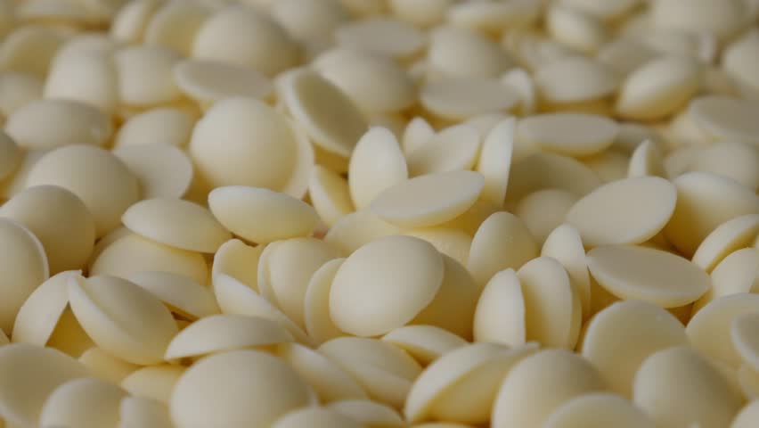 White chocolate chips Pistols buttons. Confection and pastry concept.