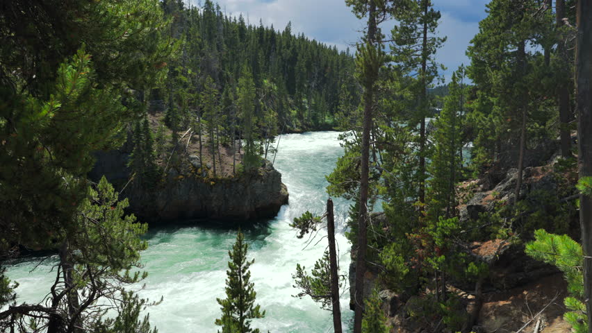 Experience the stunning Lower Falls along with the breathtaking views of the Grand Canyon of the Yellowstone River in the incredible Yellowstone National Park located in beautiful Wyoming, USA