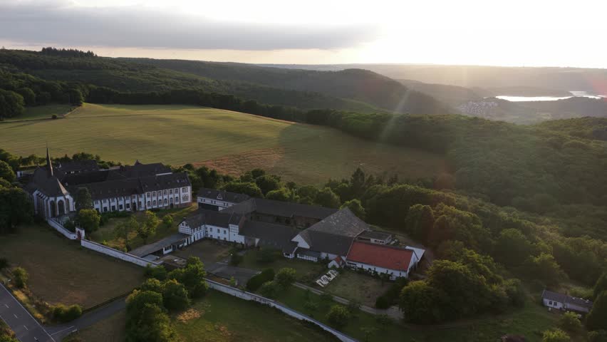 Reichenstein Monastery in Kalterherberg, Monschau, Germany. Aerial video at sunset.