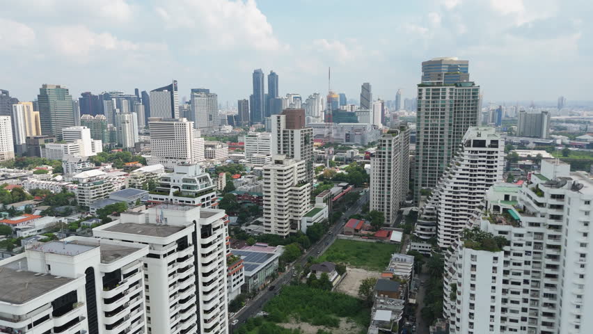 Bangkok Skyline With Commercial Buildings, Condominiums, And Corporate Offices In Thailand. - aerial shot