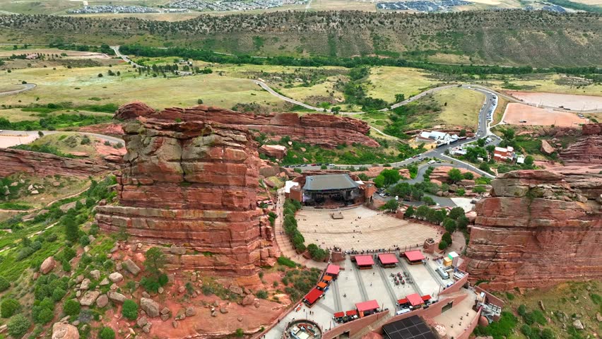 Aerial Drone view of Beautiful Red rocks Concert venue in Morrison Colorado on a summer day. -Backside