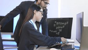 Asian female AI developer and Indian male machine learning engineer collaborate on a neural network project. Diverse tech team working with algorithms and deep learning models late at night. - Powered by Shutterstock - Get 15% off with code: PIKWIZARD15