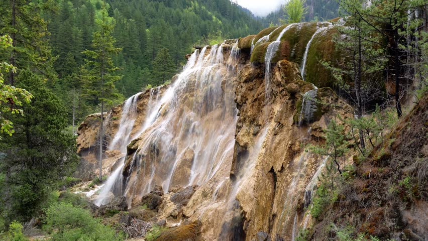Jiuzhaigou, China: Static footage of the famous Pearl Shoals waterfall in Jiuzhaigou in the mountain of Sichuan in China