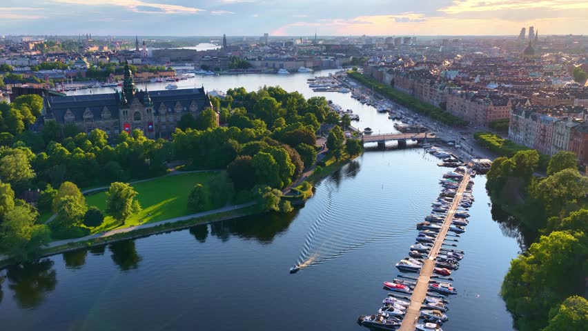 Establishing shot of Stockholm archipelago. Drone shot of downtown Stockholm, Sweden. Amazing aerial footage of Stockholm yacht canal and the Nordic Museum