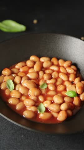 Bean stew tomato sauce cranberry beans vegetable dish beans borlotti fresh delicious gourmet food background on the table rustic food top view copy space keto and paleo diet vegan and vegan food