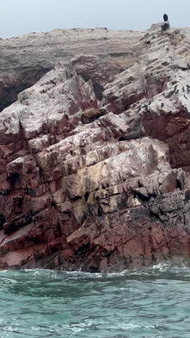 A beautiful shot of cliffs in Ballestas Islands. Peru