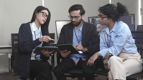 A diverse tech team, including an Indian engineer, celebrates a breakthrough in a Web3 project, collaborating on tablets. Concept for decentralized innovation and startup success. - Powered by Shutterstock - Get 15% off with code: PIKWIZARD15