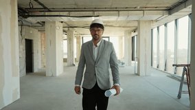 Architect walking through building under construction - Powered by Shutterstock - Get 15% off with code: PIKWIZARD15