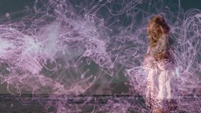 Model walking dusk beach sparking purple light trails swirling upward enveloping body for tech demo. Fire, mystic, ethereal, illumination, energy, tranquility, elegance - Powered by Shutterstock - Get 15% off with code: PIKWIZARD15