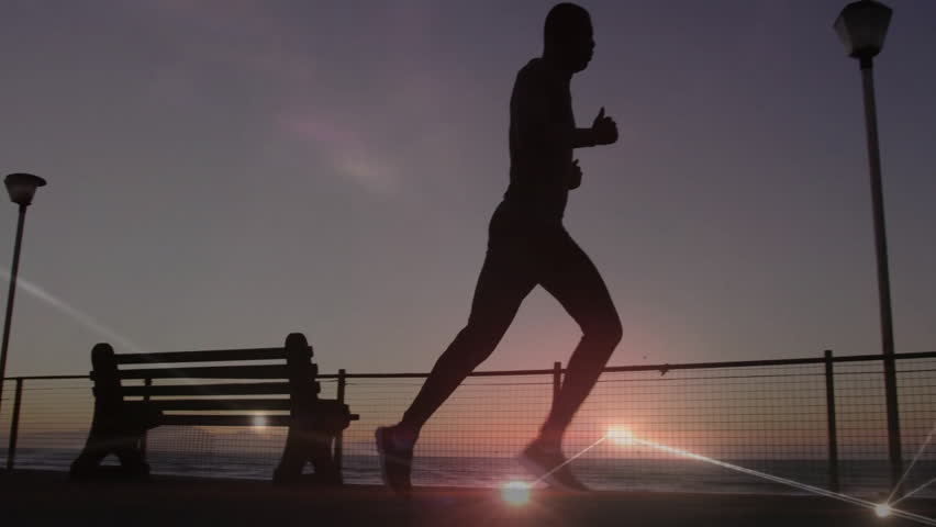 Fitness runner noticing sunrise jogging past bench promenade with network overlay tracking pace. Athletic, sunrise, silhouette, discipline, motivation, outdoor, minimalist