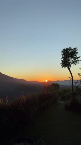 Tranquil Sunrise Over Mountain Landscape
