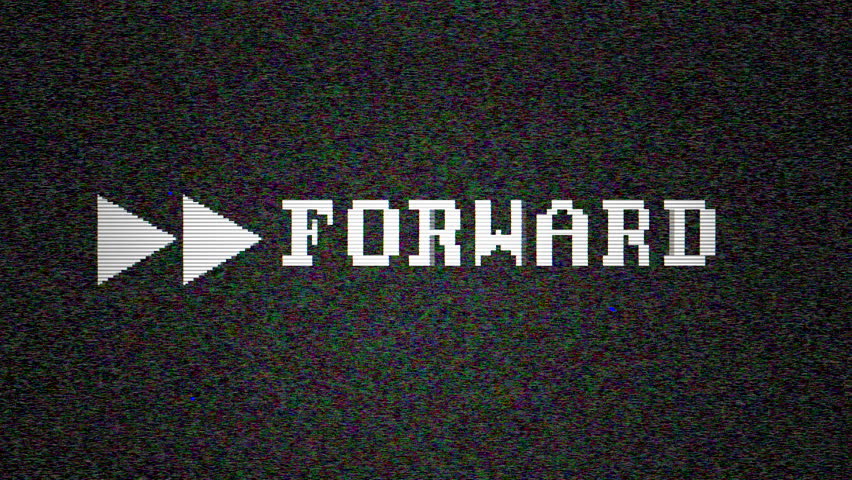 Vintage monitor displays "forward" icon flickering on VHS video screen