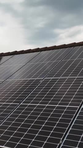 Solar Panels Installed on a Residential House Roof for Green Energy