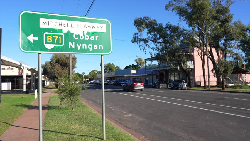 Shot of road signage point towards Cobar and the Mitchell Highway in Bourke, NSW Australia