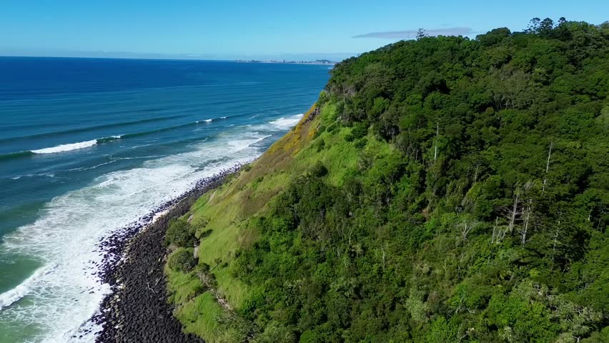 Stunning drone video of Burleigh Head National Park from the ocean, showing Gold Coast Southern beaches