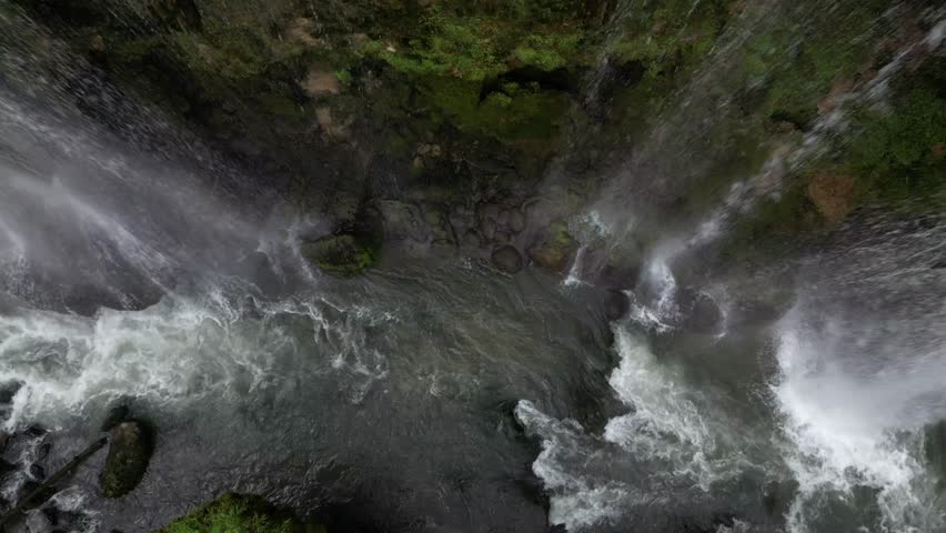 The spectacular waterfall at Marmore Falls, seen from a drone: the melted water from the glacier begins its journey toward the sea after the spring thaw.  drought aridity 