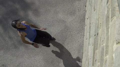 Backflip - A free runner back flips off a wall in super slow motion