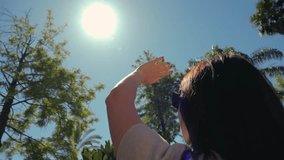 The silhouette of a hand of man reaching for the sun. Silhouette of a hand in the sun. High quality 4k footage - Powered by Shutterstock - Get 15% off with code: PIKWIZARD15