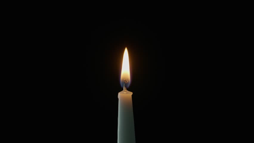 Closeup shot wind stopping candle flame in darkness. Wax taper fire snuffed on black background. Nighttime glows softly with flickering lights. Smoke rising slowly from wick. Memory religion concept - Powered by Shutterstock - Get 15% off with code: PIKWIZARD15