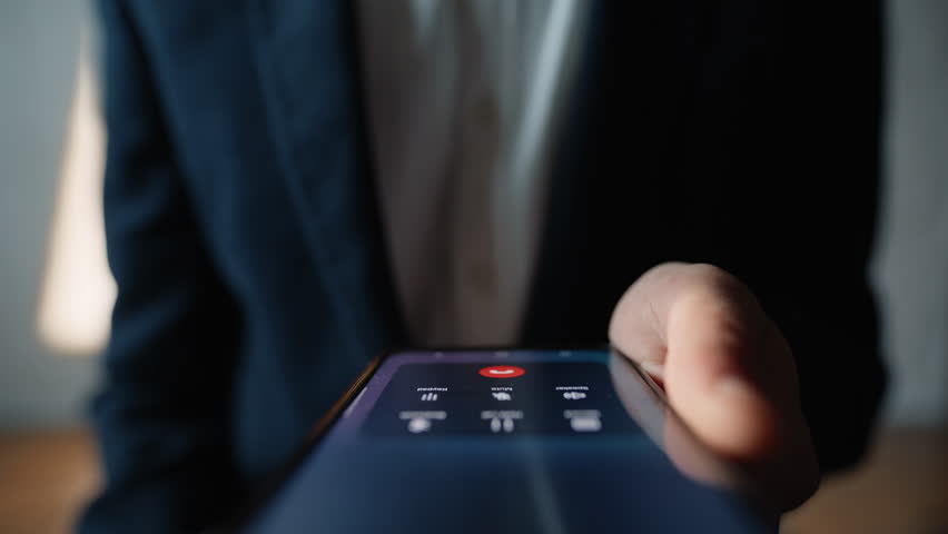 Unknown user ending call touching red button at home closeup. Man hanging up incoming chat holding mobile phone at office. Anonymous person pressing key on screen. Male figure finishing conversation