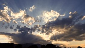 Crepuscular god rays moving peacefully over the early sunset clouds. - Powered by Shutterstock - Get 15% off with code: PIKWIZARD15