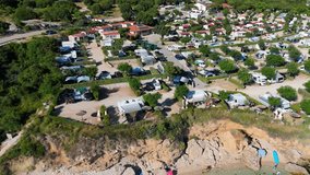 Beautiful Young Woman in Bikini Stand Up Paddling Sup Surfing in Stara Baska Skrila Beach Krk Island, Croatia. Mediterranean Summer. Aerial Shot From Above. Blue Sea the Rocks Mountains and Coastline - Powered by Shutterstock - Get 15% off with code: PIKWIZARD15