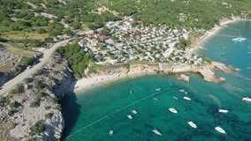 Beautiful Young Woman in Bikini Stand Up Paddling Sup Surfing in Stara Baska Skrila Beach Krk Island, Croatia. Mediterranean Summer. Aerial Shot From Above. Blue Sea the Rocks Mountains and Coastline - Powered by Shutterstock - Get 15% off with code: PIKWIZARD15