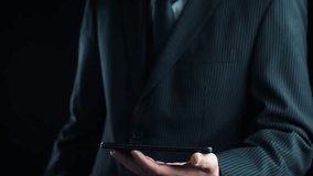 A businessman analyzes customer satisfaction data on his smartphone, showcasing a digital rating system with emoticons and reviews in a sleek, dark setting. Qubit - Powered by Shutterstock - Get 15% off with code: PIKWIZARD15