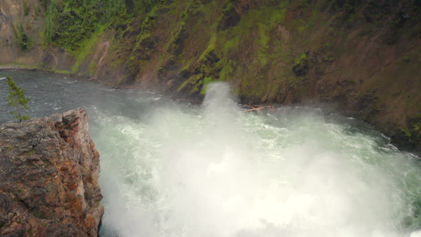 Explore the stunning Lower Falls in Yellowstone National Park, Wyoming. This iconic site offers thrilling adventures, perfect for nature lovers seeking peace in the majestic wilderness