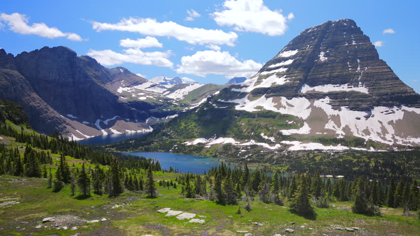 Embark on an adventure to Glacier National Park, surrounded by majestic mountains, crystalclear lakes, and vibrant greenery. Its an unforgettable journey and exploration youll cherish